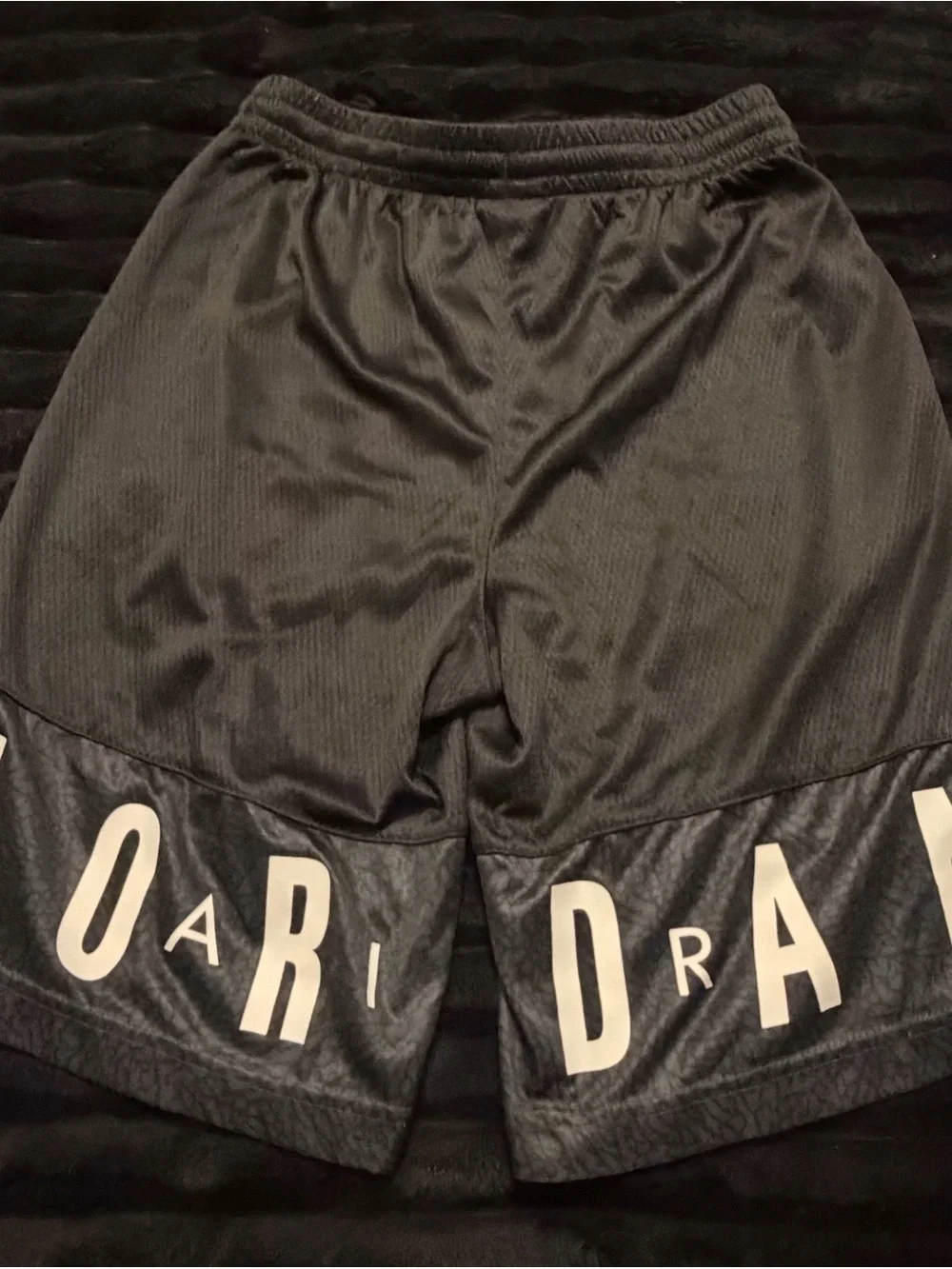 Jordan Black Athletic Mesh Shorts with Logo Hem